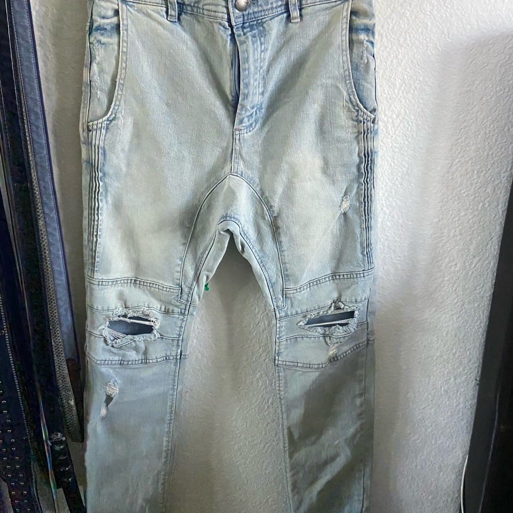 Distressed Light Wash Denim Jeans